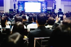 Employees listening to a presentation